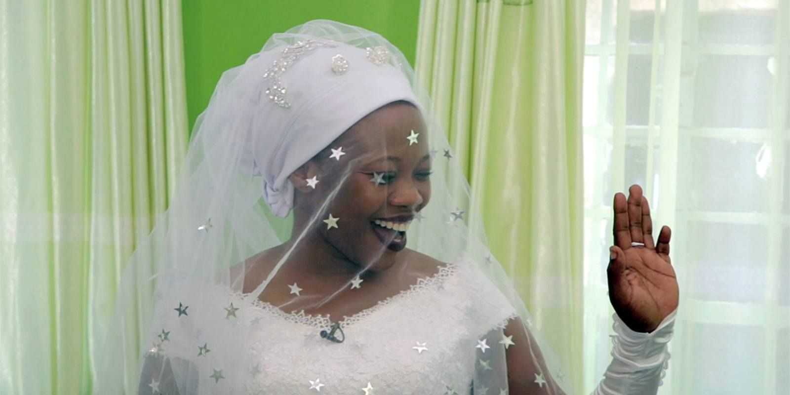 1566810622 y her sister tucked her braids inside the kilemba and the veil was pinned on top of it